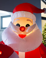 Pre-Lit Inflatable Flashing Santa with Candy Cane, 6 ft